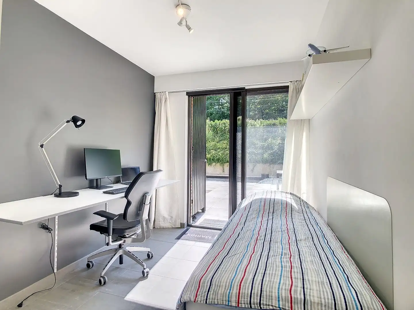 Goed gelegen gerenoveerd appartement met twee ruime slaapkamers, terras (25 m²) en garagebox - bewoonbare oppervlakte 73 m²        foto 10