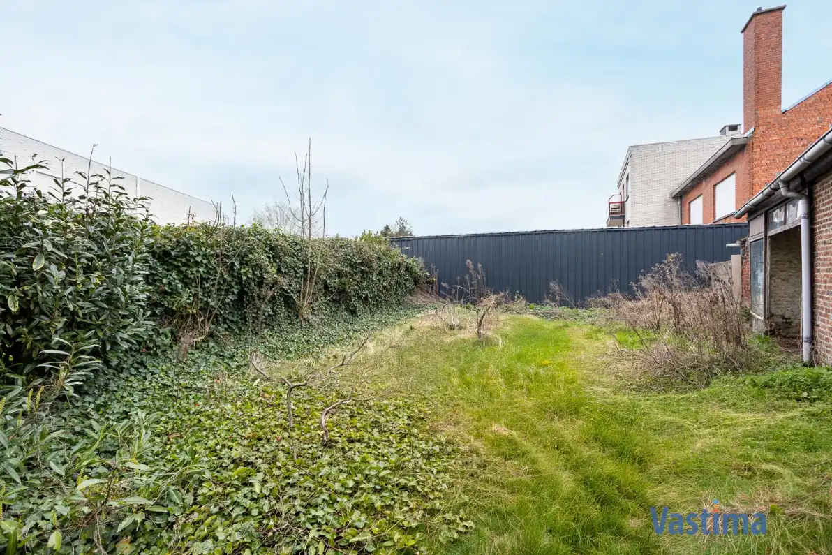 Unieke bouwgrond in het hart van Merchtem foto 15