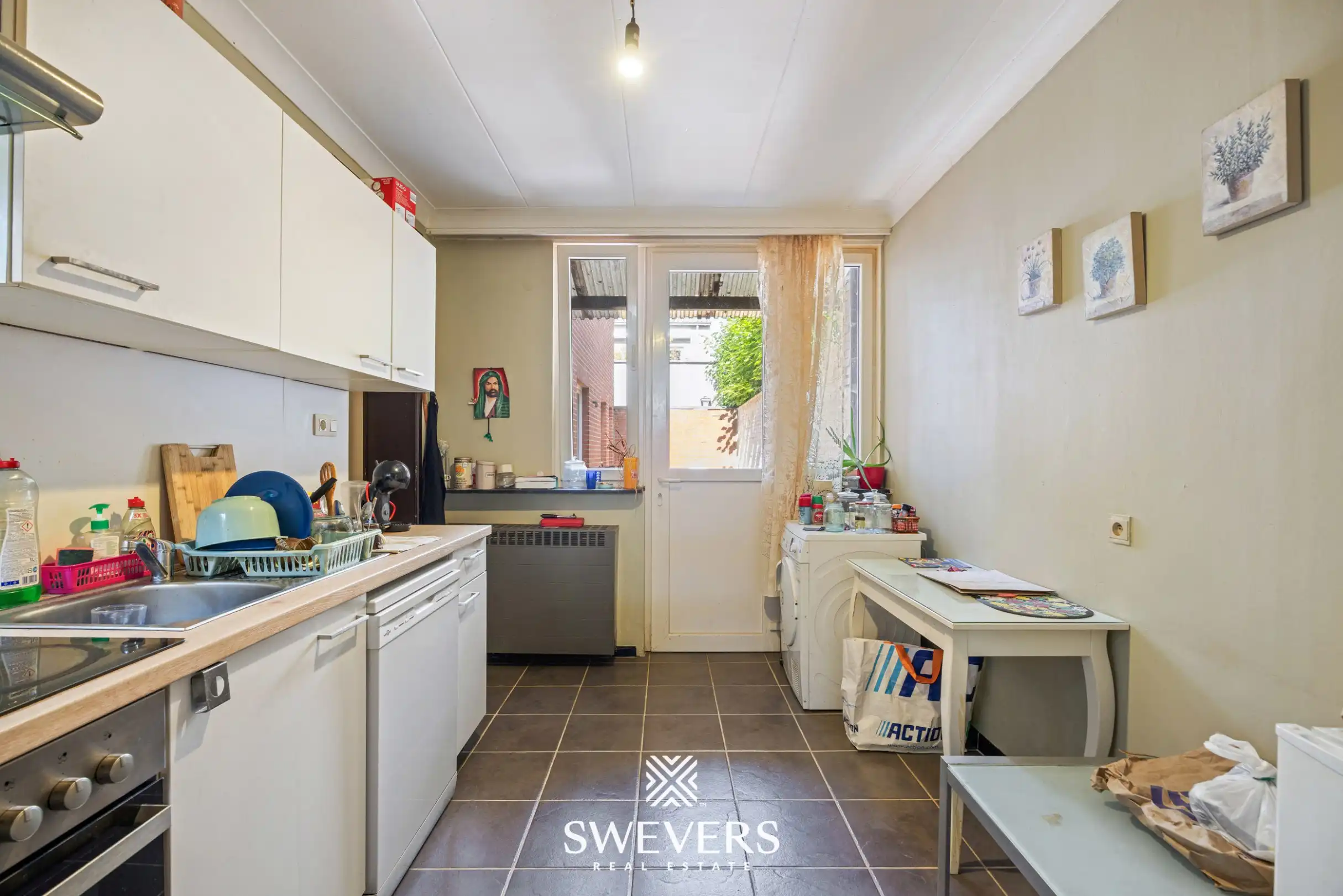 Gerenoveerd investeringspand met 2 verhuurde appartementen te Leopoldsburg foto 9