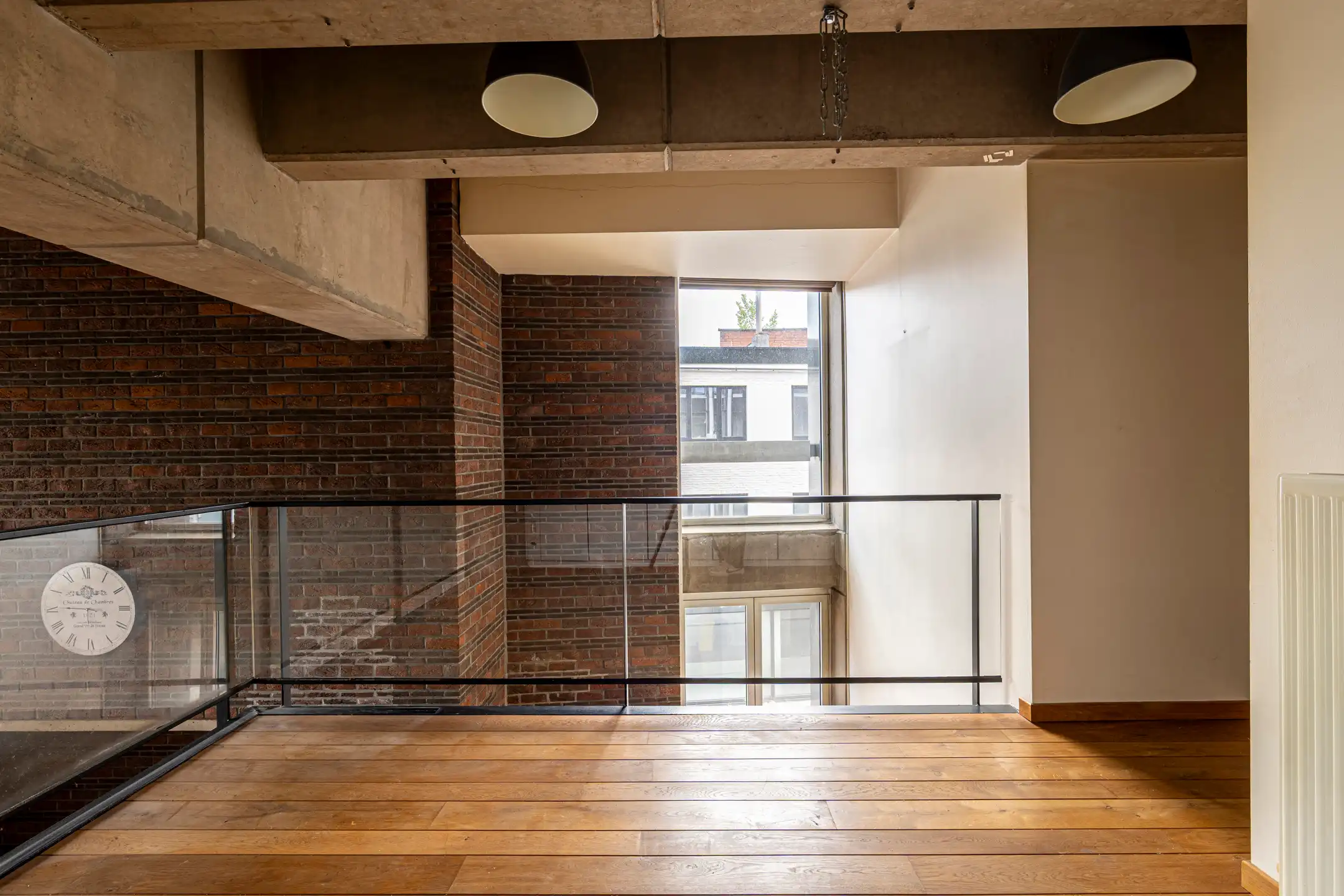 Duplex in loftstijl inclusief ondergrondse parking op de Grote Markt foto 21