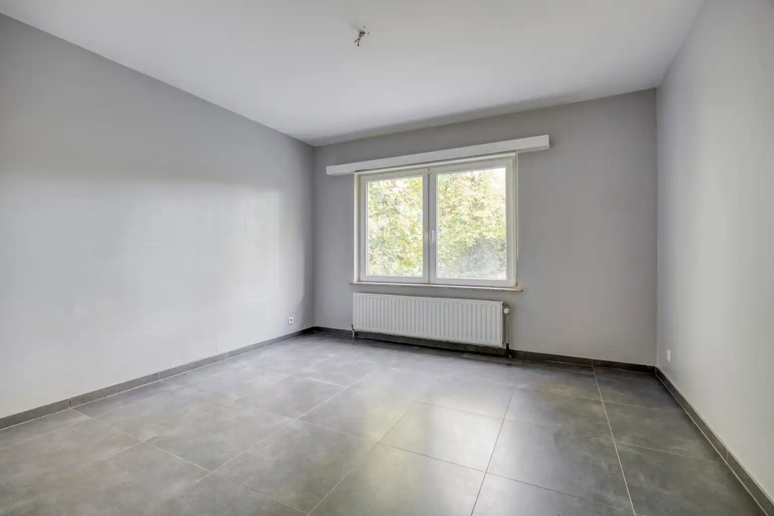 Instapklaar gelijkvloers appartement met eigen tuin foto 9