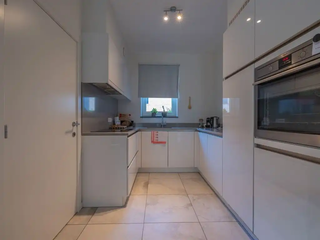 Modern gelijkvloers appartement met ruim terras en private tuin foto 9