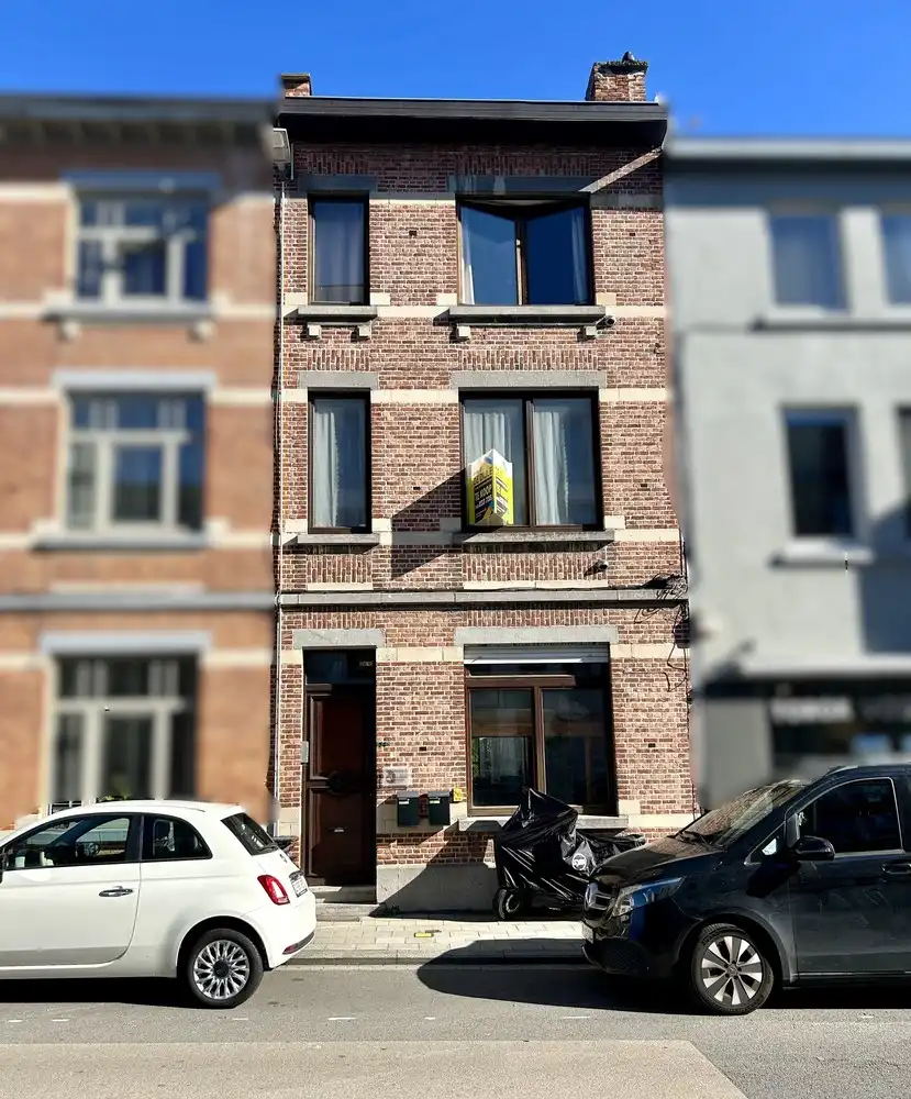 Statige herenwoning met karakter en topligging in hartje Heverlee foto {{pictureIndex}}