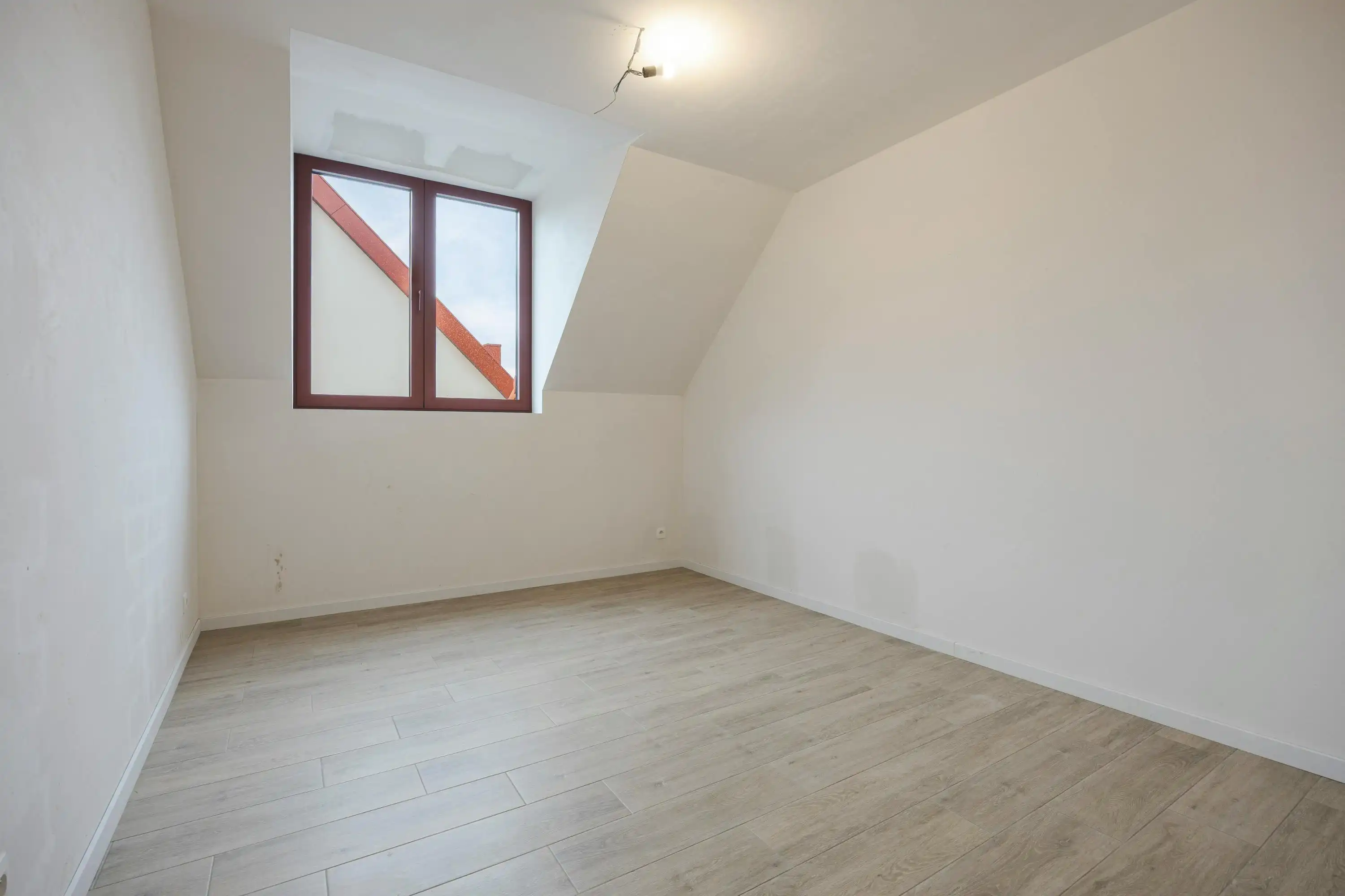Ruime en lichtrijke triplex met 2 slaapkamers in Hasselt foto 12