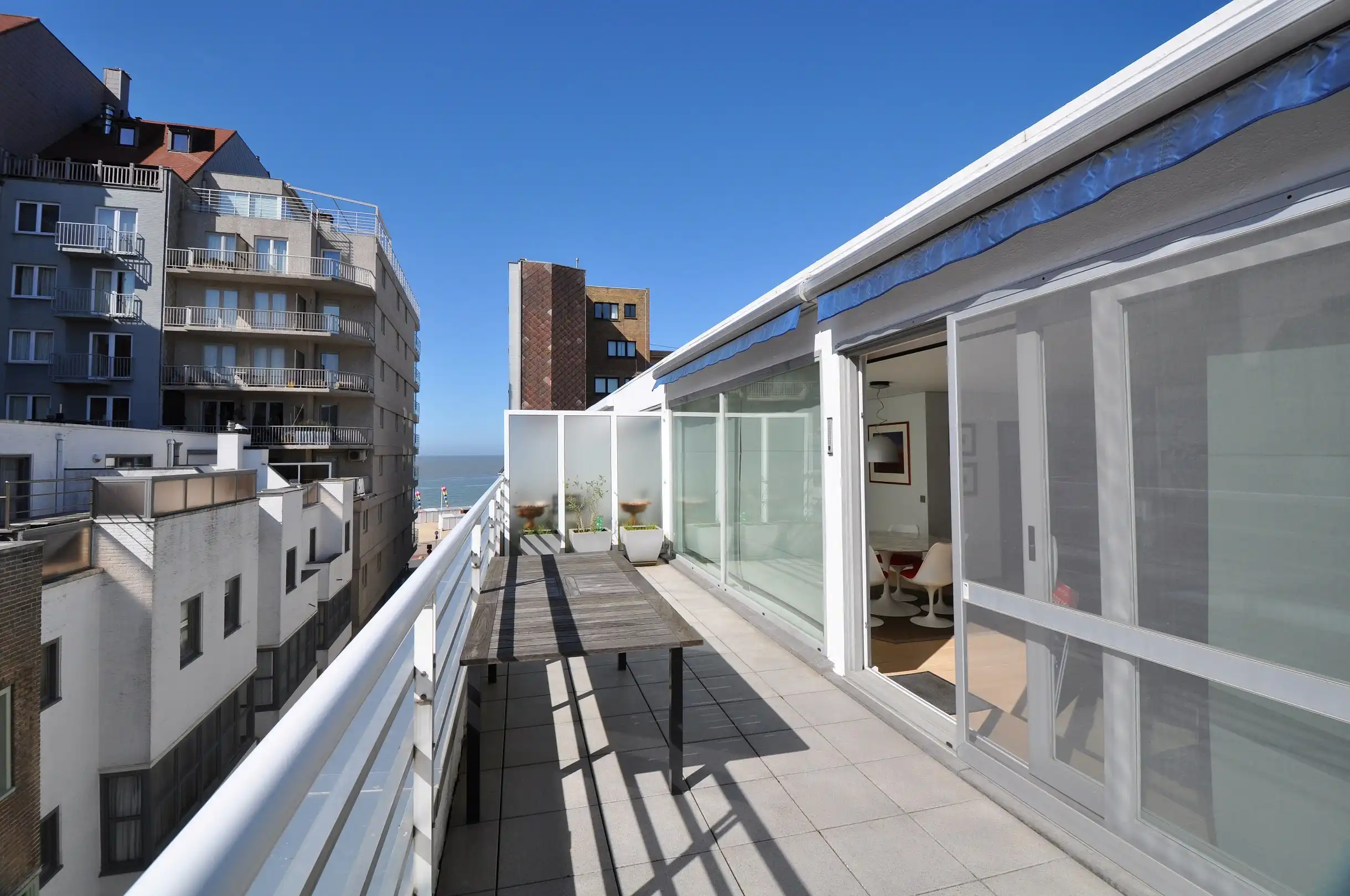 Exclusief: instapklare penthouse met een ruim zonnig terras. foto {{pictureIndex}}