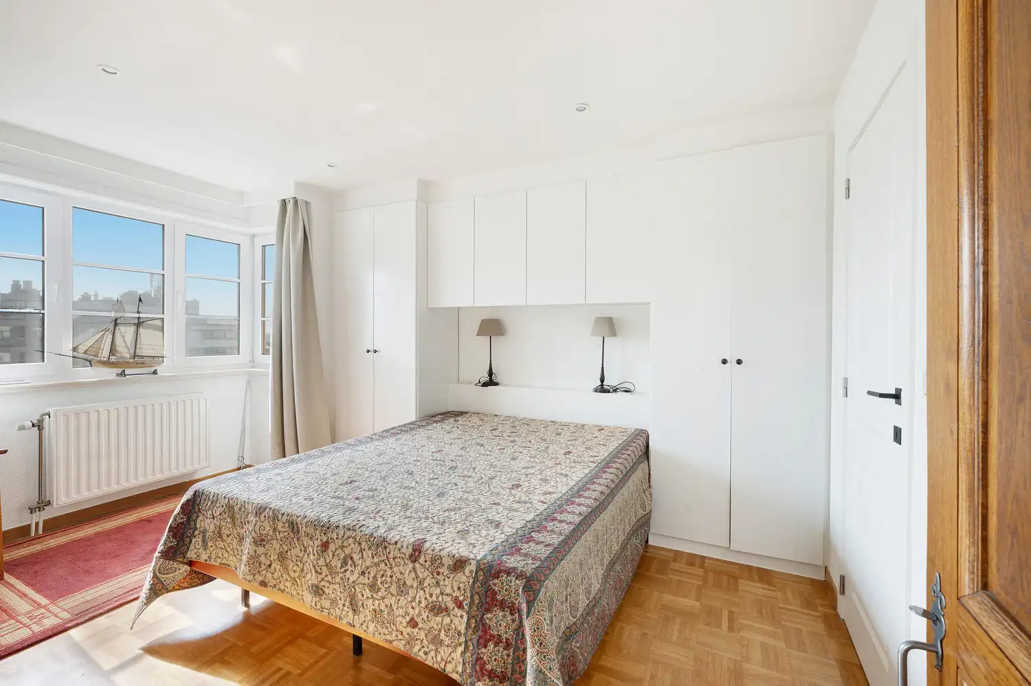 Exclusief duplexappartement met riant zonneterras en panoramisch zeezicht aan het Heldenplein foto 10