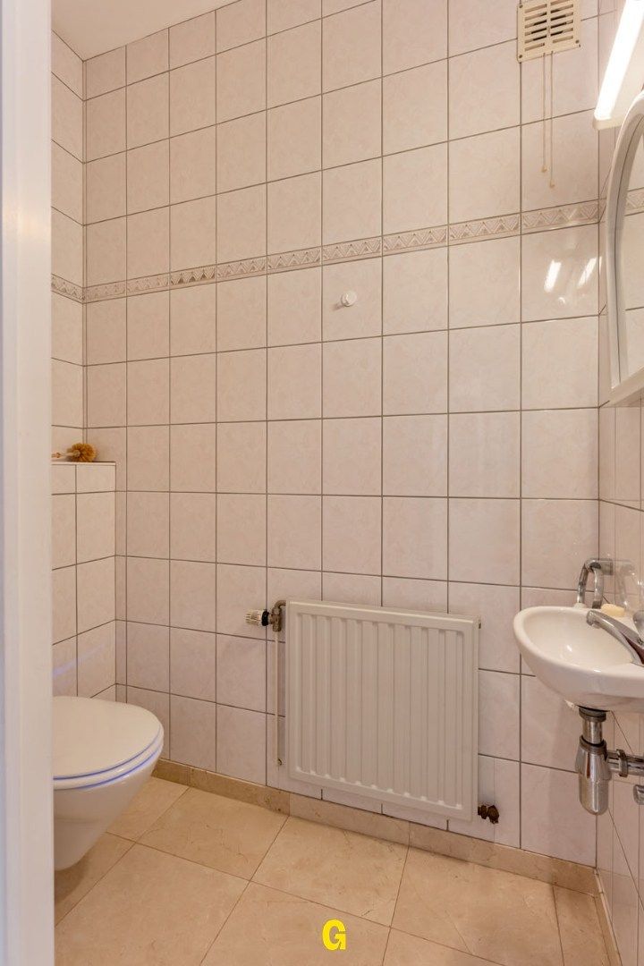 Bijzonder nette rijwoning van zeer degelijke kwaliteit, met tuin op 6a 46ca, vlak bij de dorpskern van Hoeselt. foto 16