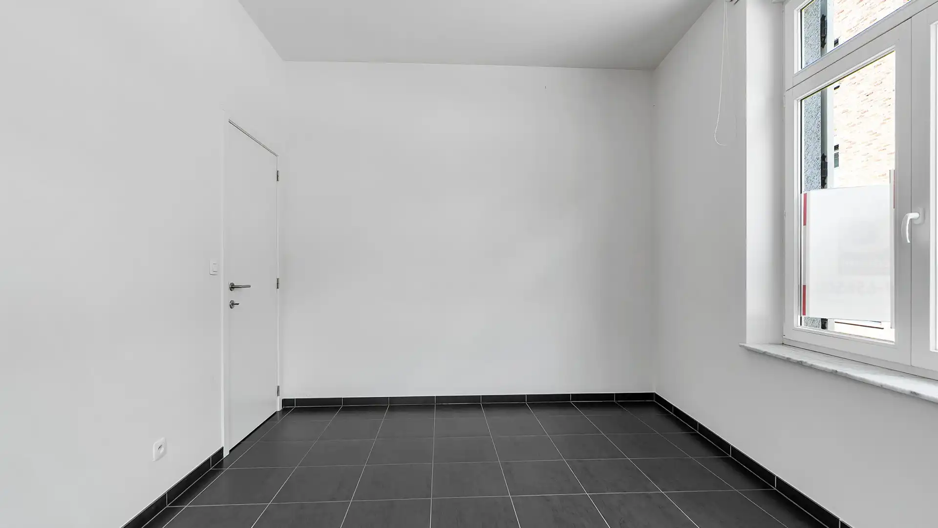 Gelijkvloers appartement met terras en private parking. Uitstekende ligging aan de vernieuwde Markt. foto 17