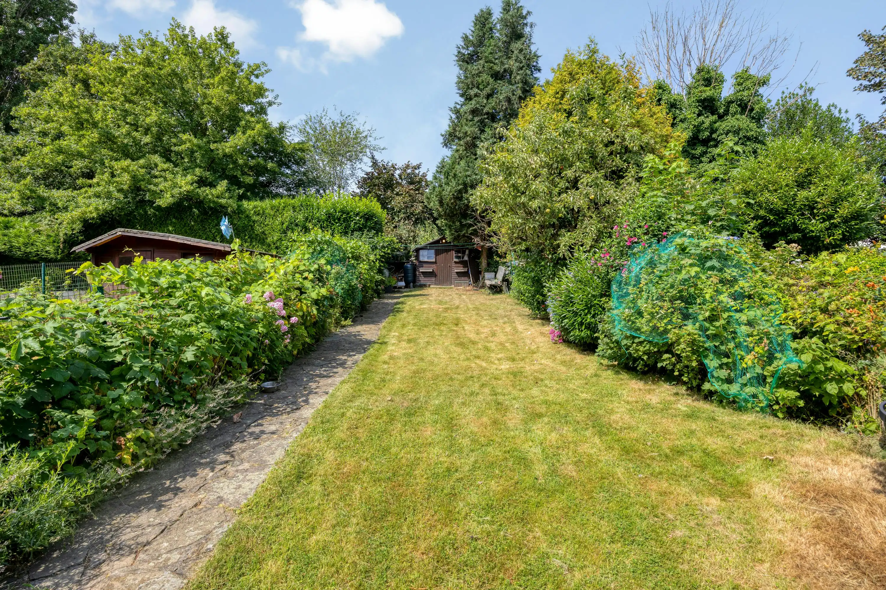 Gezinswoning te koop in Strombeek-Bever met tuin en garage foto 14