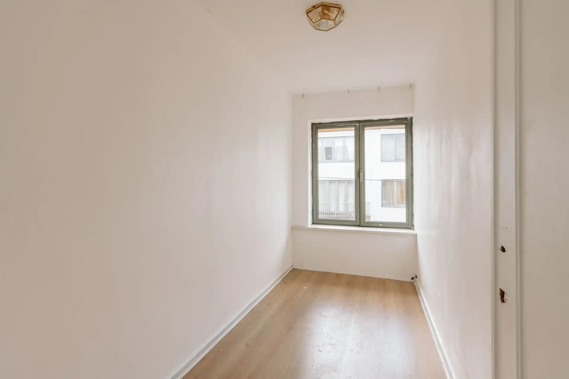 Ruim handelspand met magazijn in centrum Borsbeek. foto 16