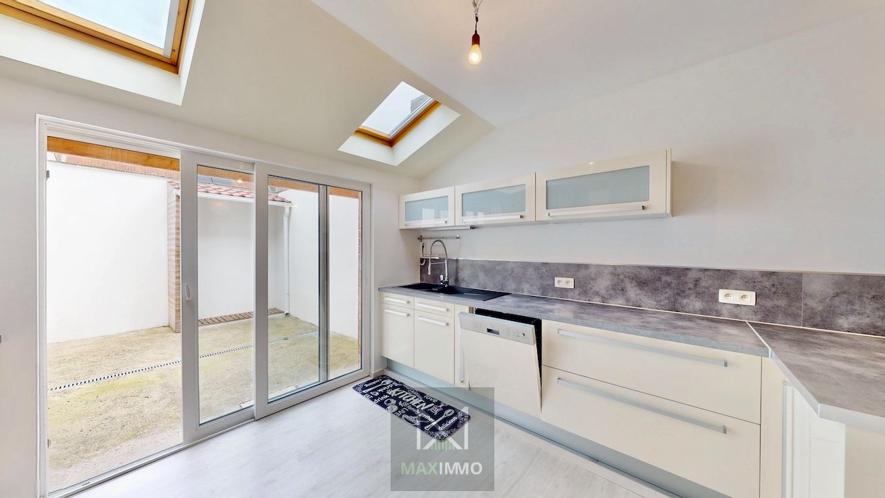 Gerenoveerde woning met 3 slaapkamers en stadstuin foto 8