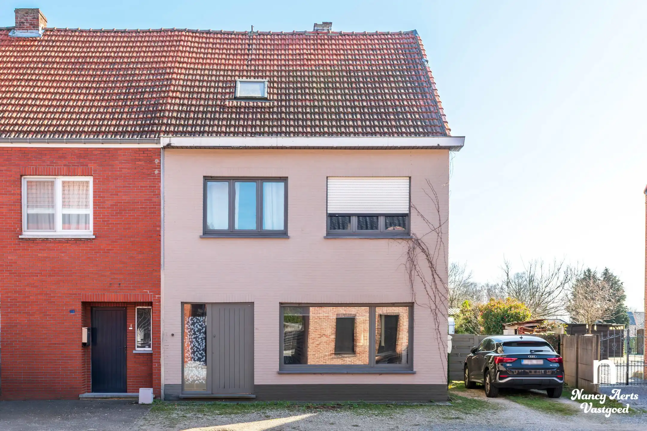 Ruime halfopen woning met tuin en veel potentieel foto 20