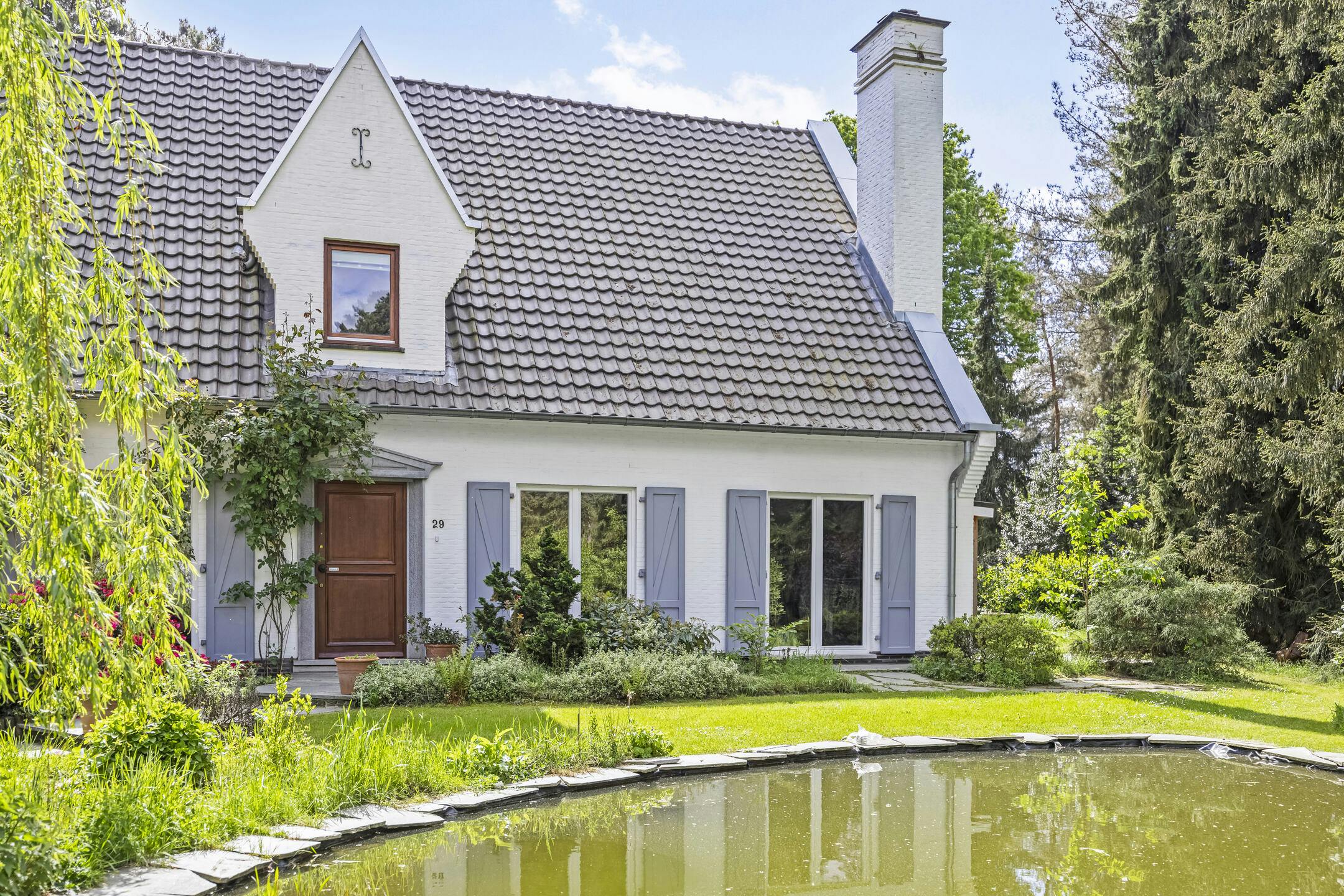 Villa met vakantiewoning te koop in Maasmechelen foto 2