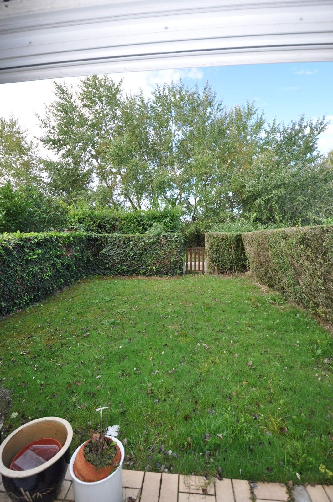 Verzorgde woning met zonnige tuin foto 15