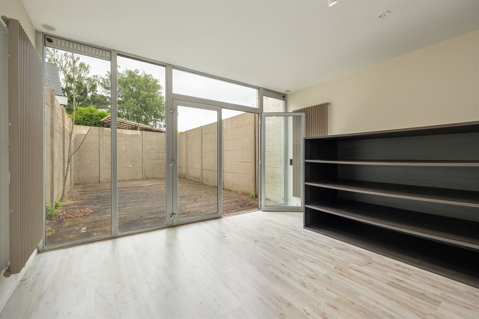 Handelshuis met ruime winkel en duplex appartement in dorp 's Gravenwezel foto 7