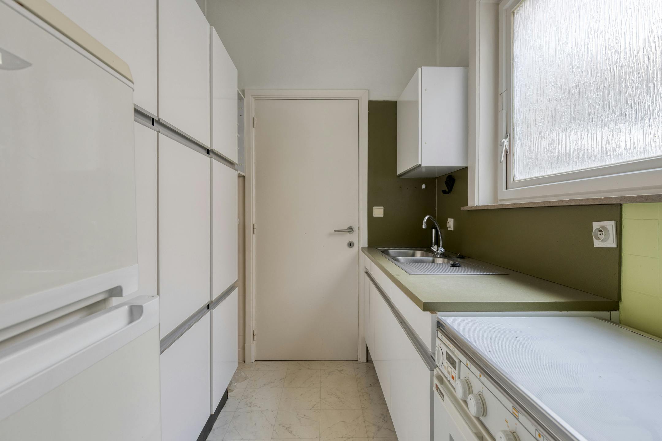 Patrimoniumvennootschap met handelspand en 2 appartementen foto 18