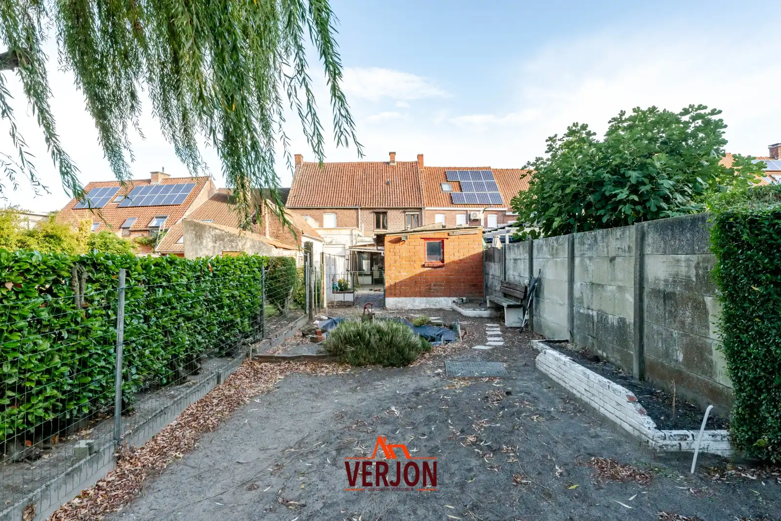 Charmante woning met ruime tuin te koop op het dorpsplein in Kachtem! foto 19