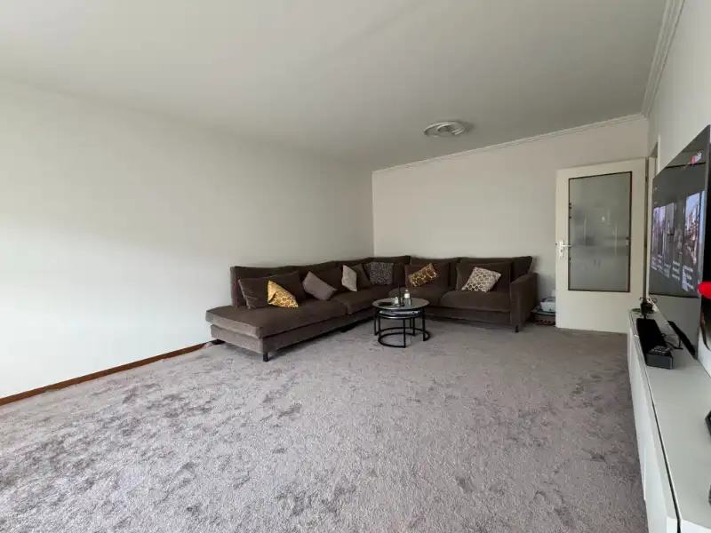 Gelijkvloers 2 slpk. appartement met tuin en garage foto 3