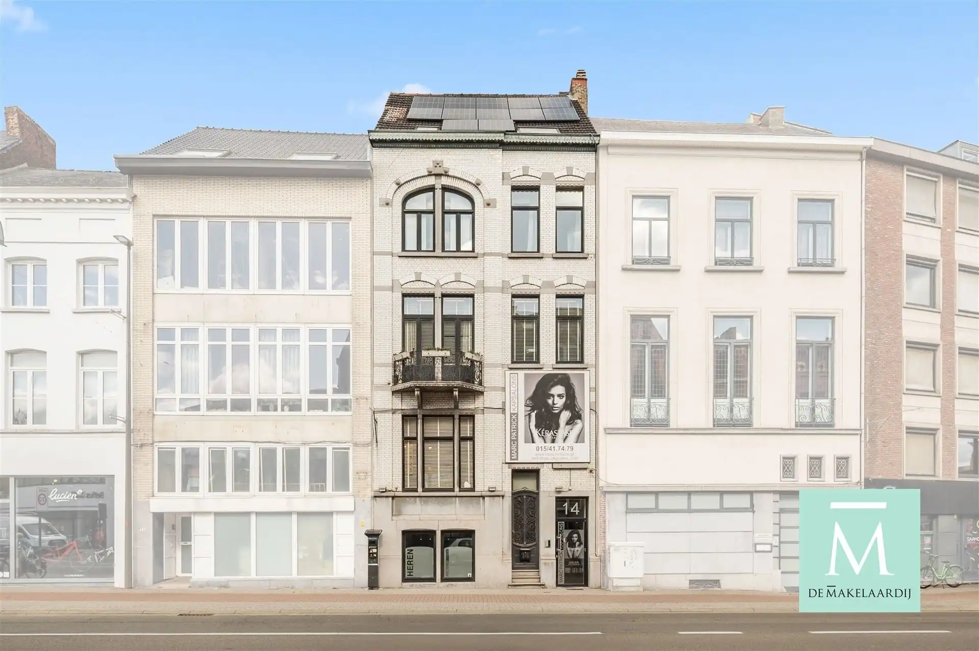 Prachtige handelswoning met overdekte garage nabij de vaart te Mechelen foto {{pictureIndex}}