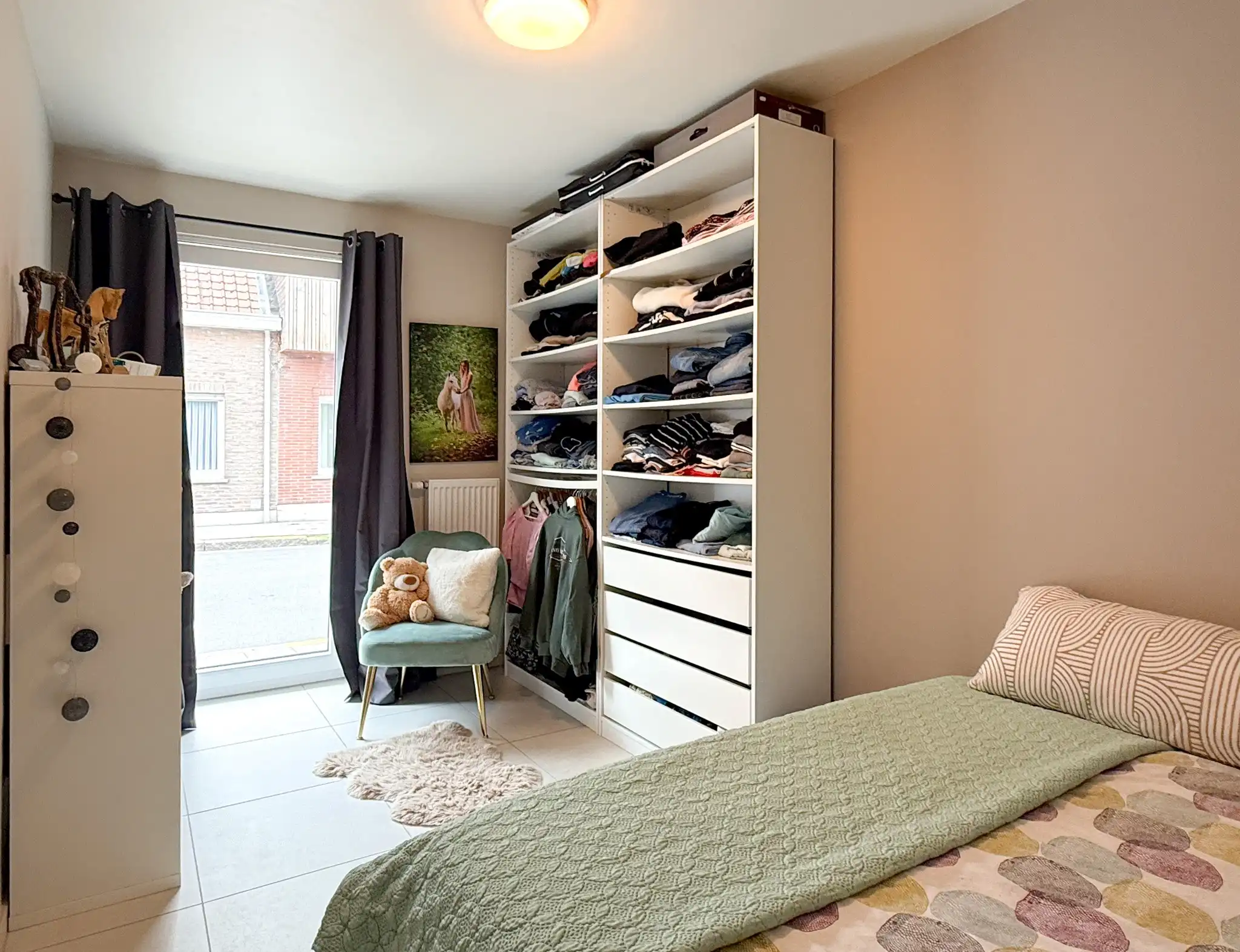 Gelijkvoers appartement met twee slaapkamers en tuin in het hartje van Beveren foto 9