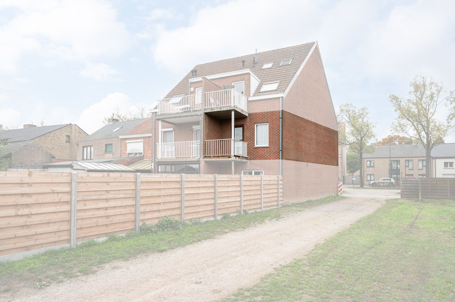 Zonnig en instapklaar appartement gelegen in de dorpskern van Kaprijke. foto 15