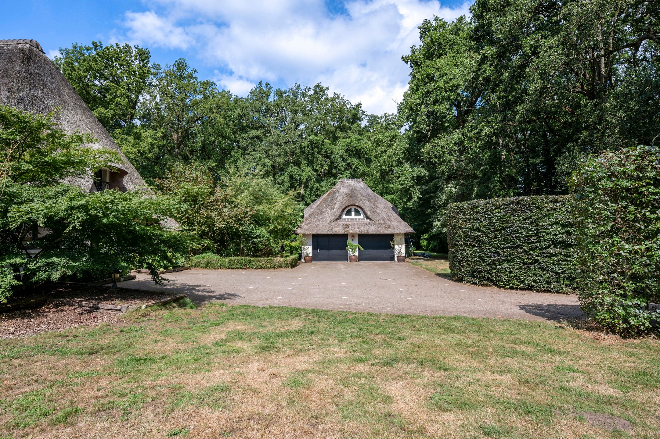 Charmante rietgedekte villa foto 40
