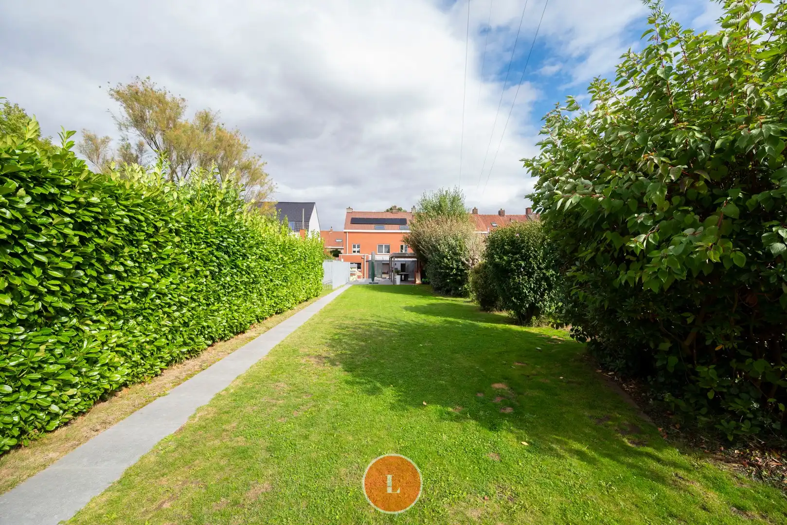 Ruime gezinswoning met grote tuin en uitweg te koop in Menen. foto 28