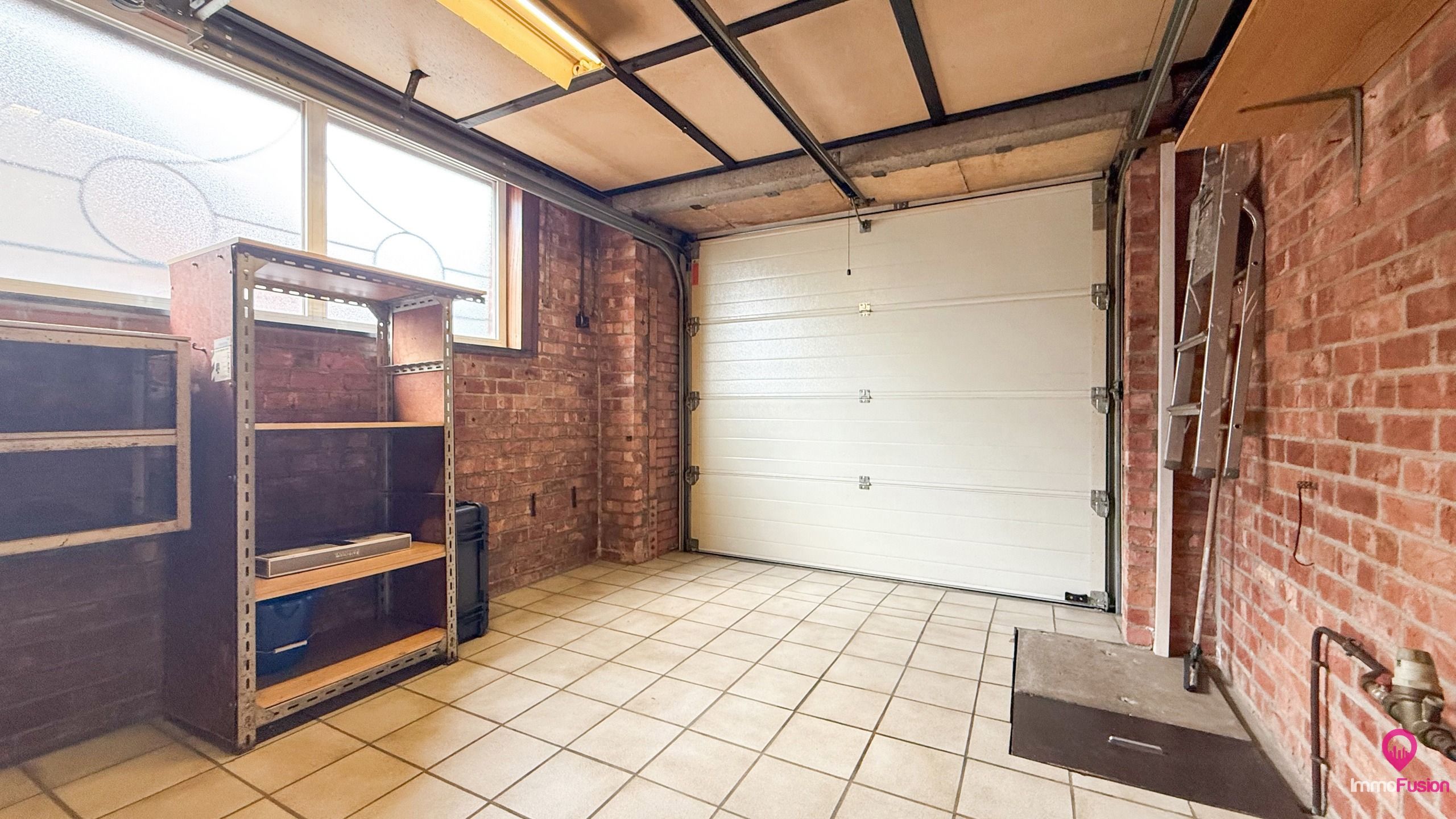 Gelijkvloerse open bebouwing op 6a45 met tuin & garage! foto 20