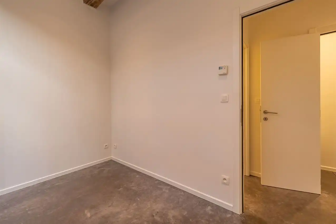 Ruim gelijkvloers appartement met zonnige tuin op toplocatie foto 21