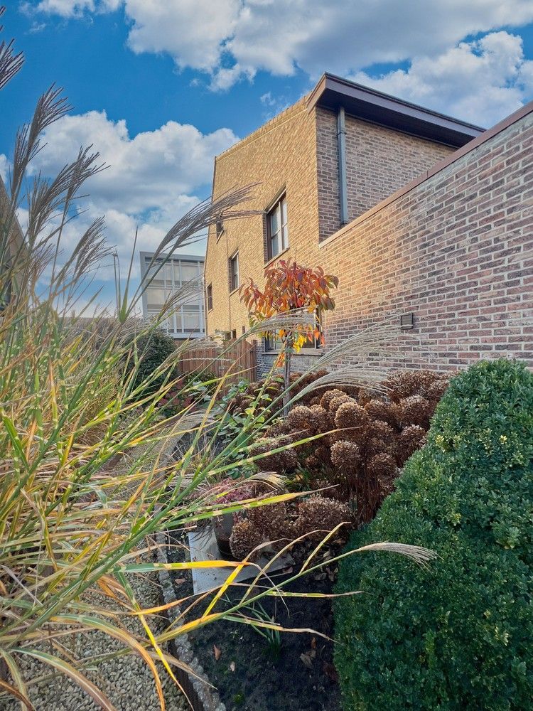 Topper! Stijlvolle woning met zonnige tuin + 2x garage foto 22