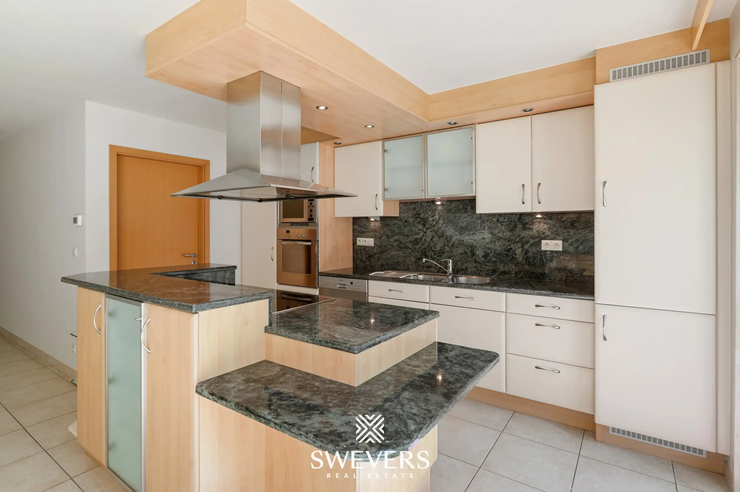 Gelijkvloers appartement met twee slaapkamers, ruime veranda en terras te Bree foto 7