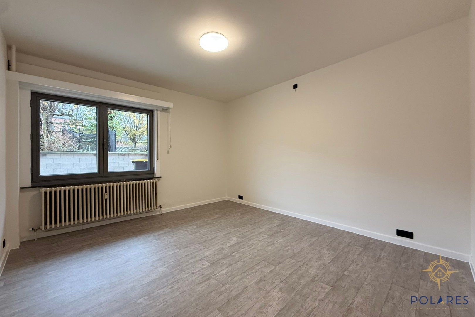 Ruim gelijkvloers appartement in het hartje van Herent foto 9