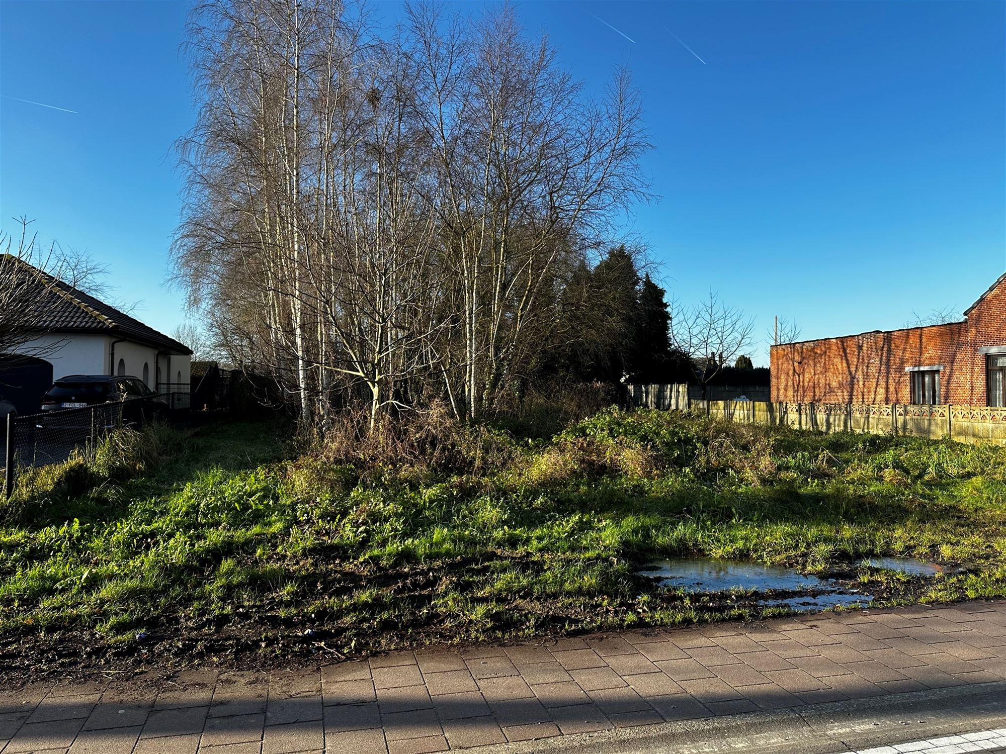 CENTRAAL GELEGEN BOUWGROND VOOR OPEN BEBOUWING MET MOGELIJKHEID TOT VERKAVELING 2 LOTEN IN HALF OPEN VERBAND foto 2