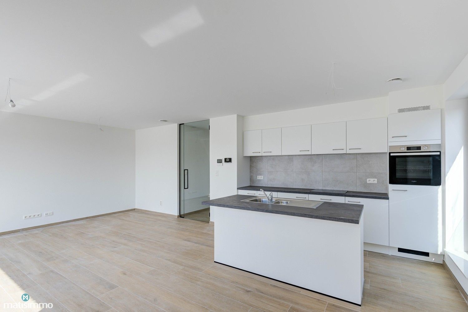 NIEUWBOUWAPPARTEMENT MET TWEE SLAAPKAMERS, RUIM TERRAS EN PARKEERPLAATS TE MUNSTERBILZEN foto 4
