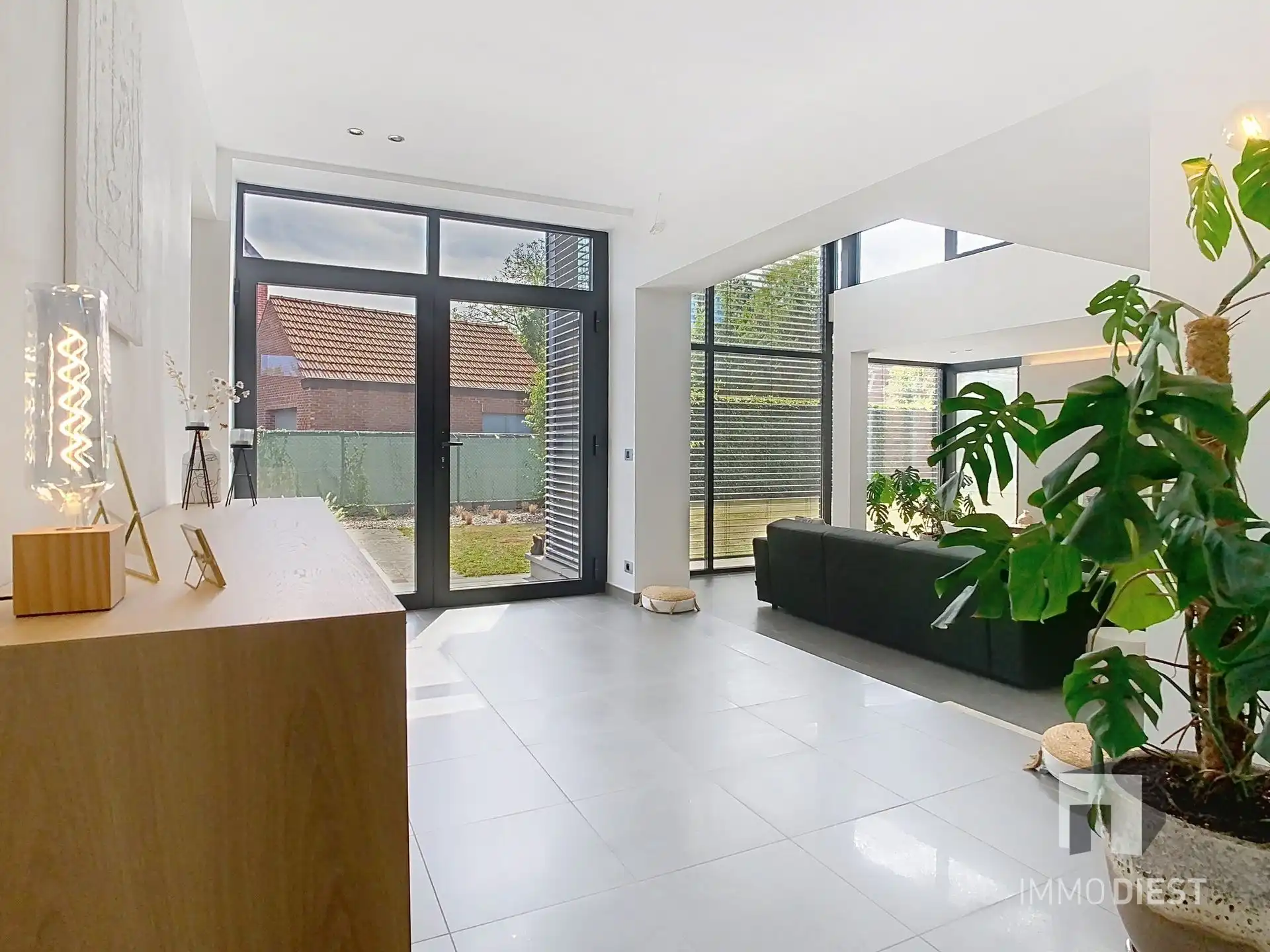 Moderne, lichtrijke woning met aangename tuin aan de voet van hartje Scherpenheuvel. foto 13