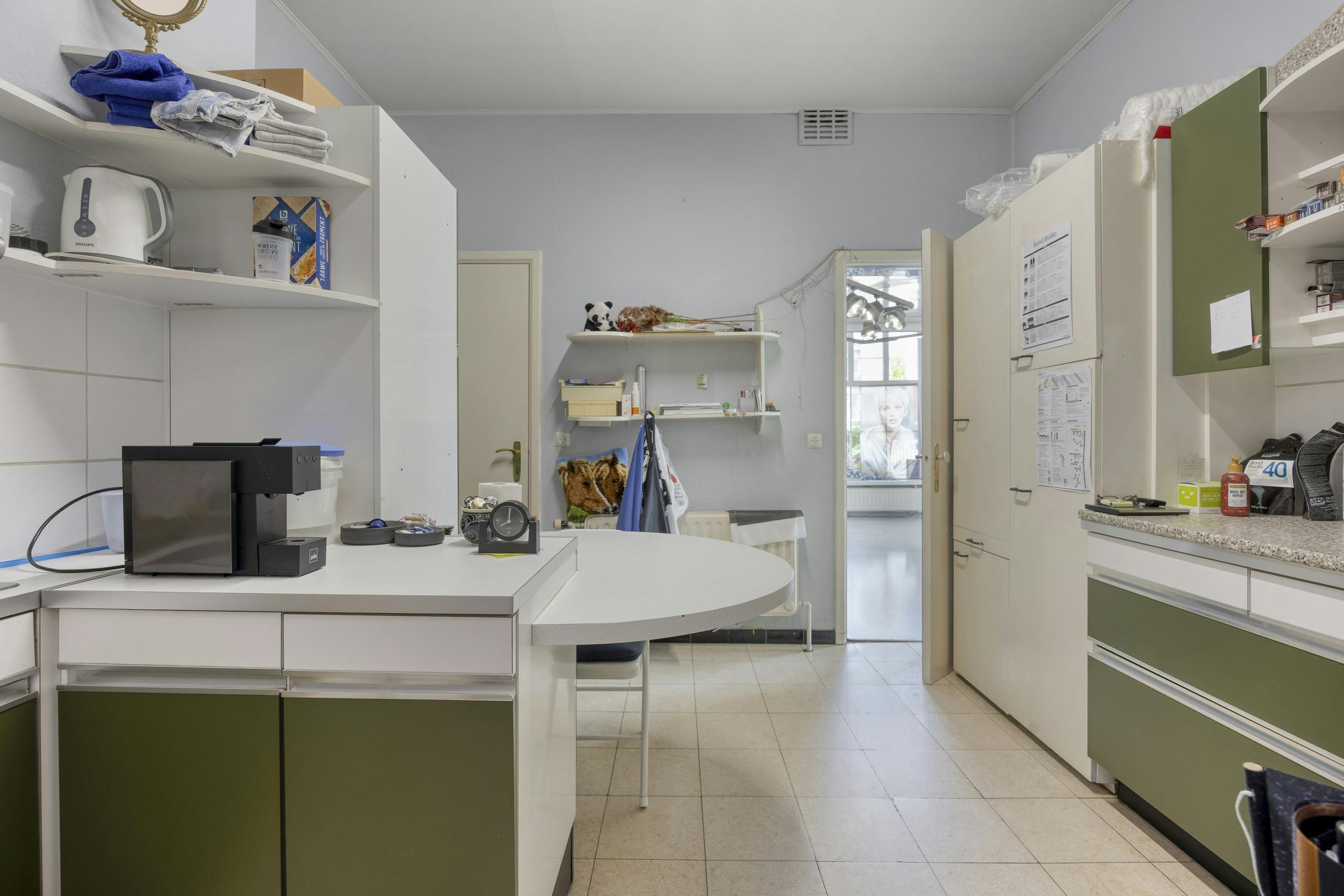 Karaktervolle driegevelwoning met commerciële ruimte in hartje Vilvoorde foto 12