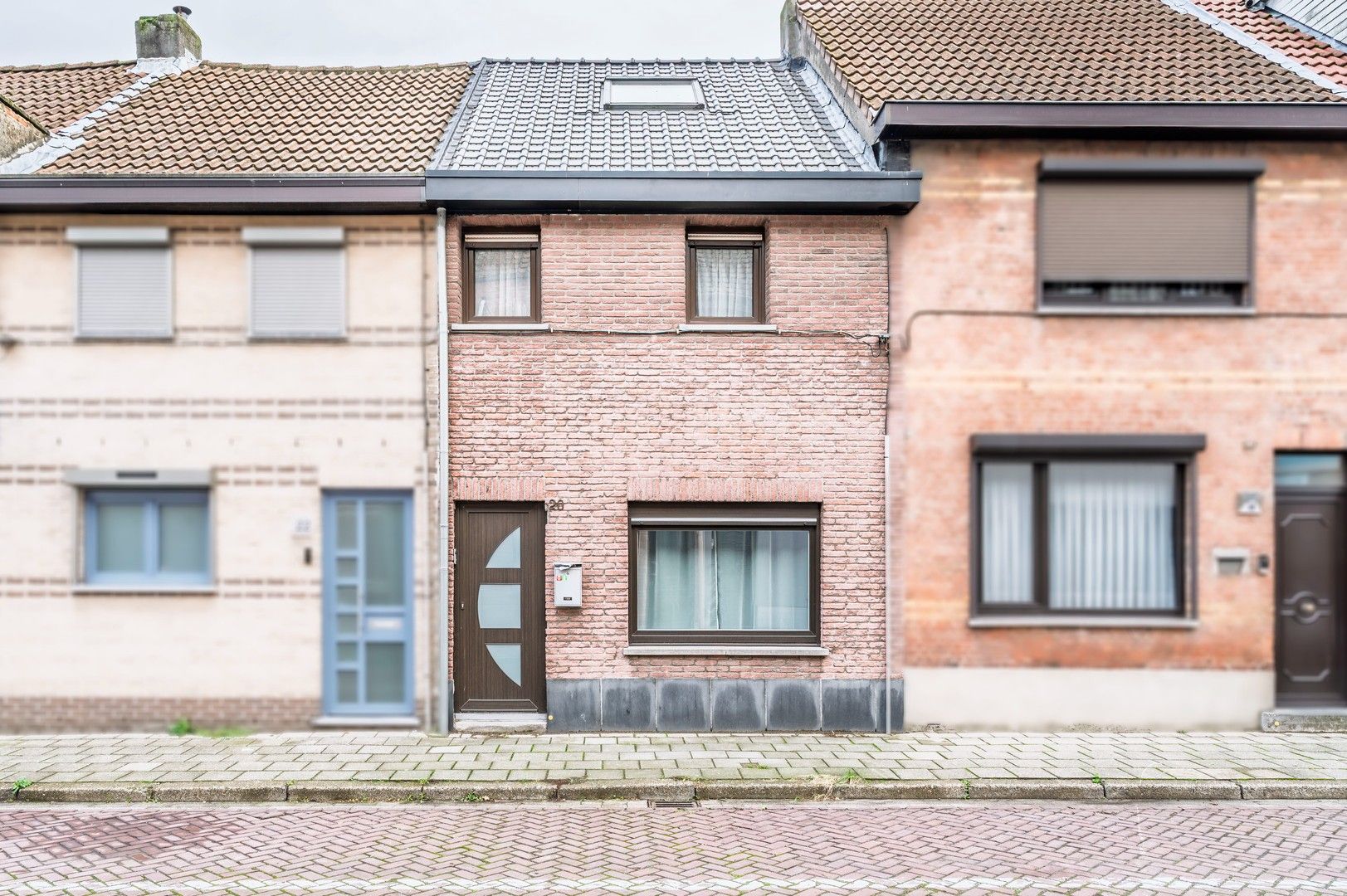 Gezellige starterswoning met garage. foto {{pictureIndex}}