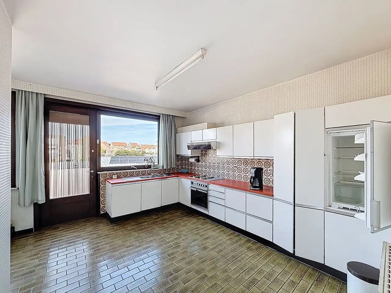 Bel-étage woning met drie slaapkamers en twee garages in het centrum van Heist-Aan-Zee foto 11
