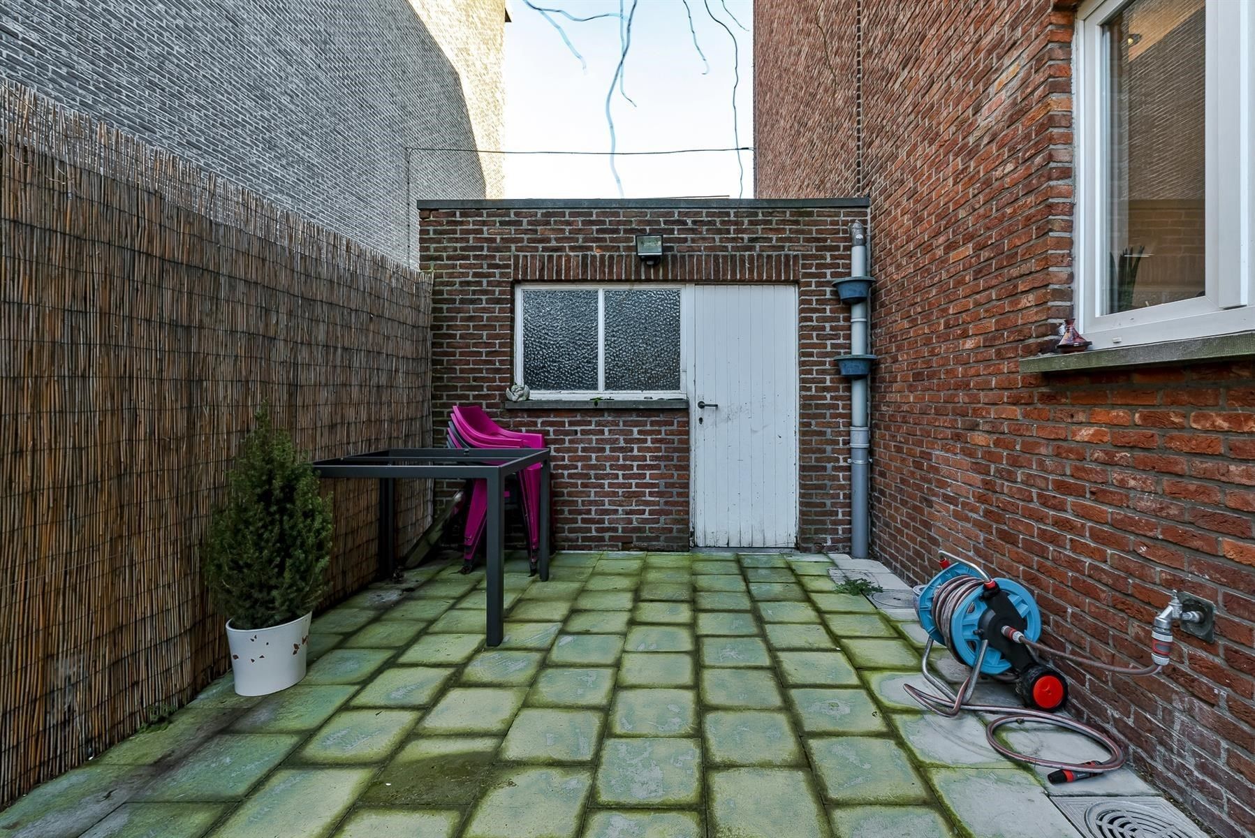Gelijkvloers appartement met tuin foto 8