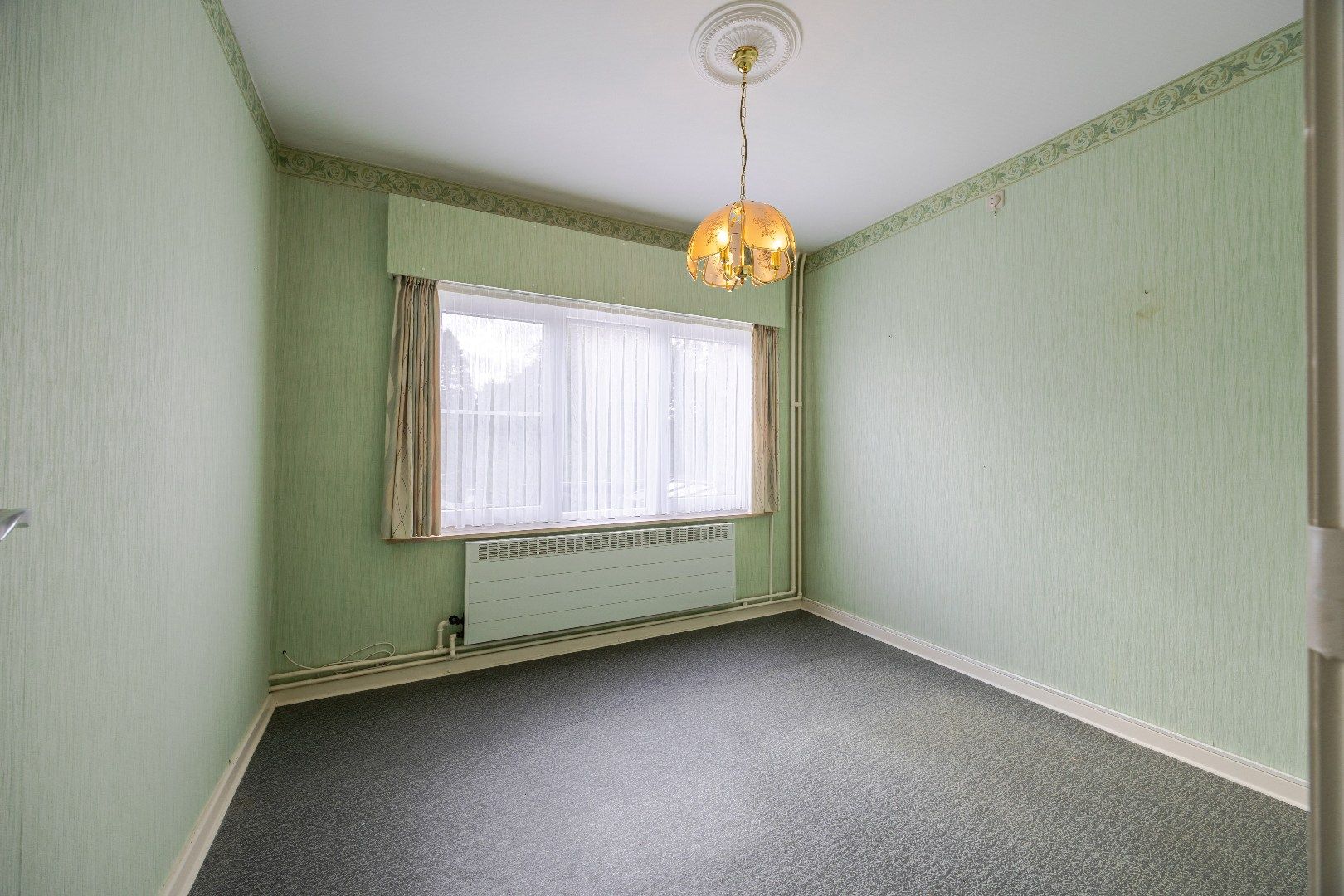 Goed onderhouden woning met ruime tuin in St-Joris. foto 12