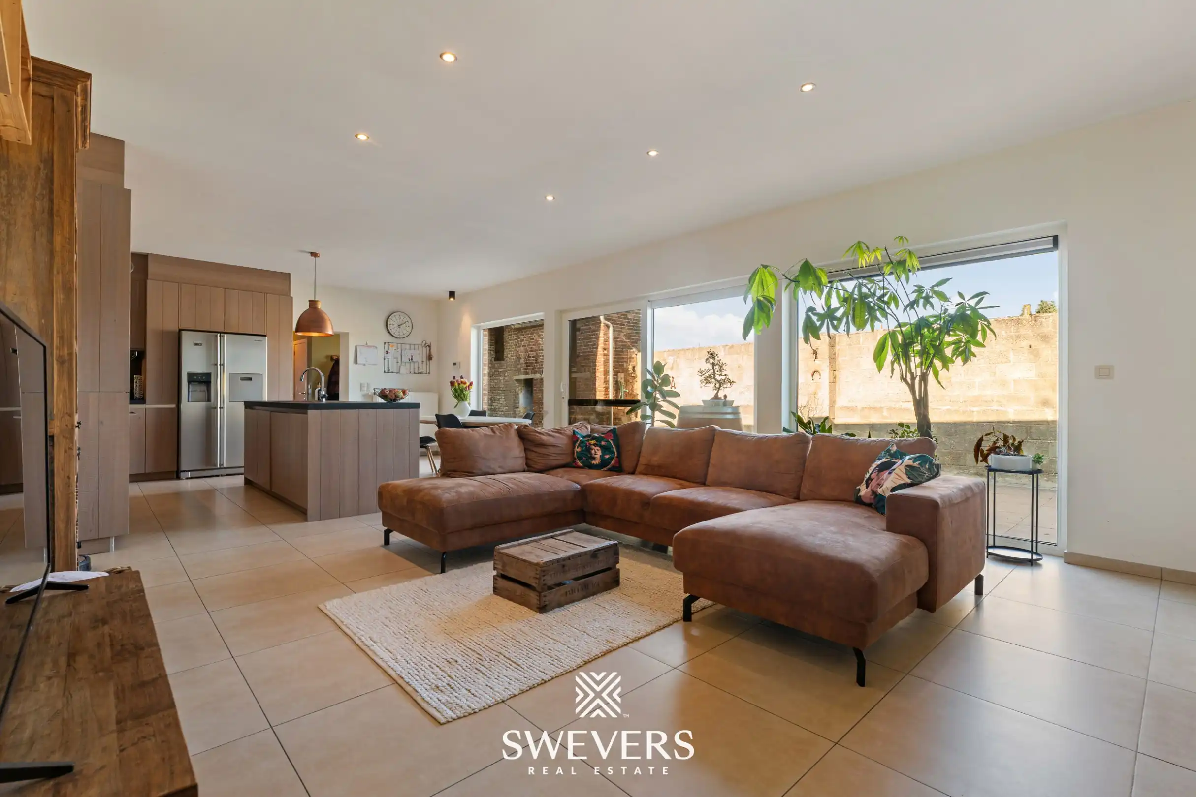 Instapklare open bebouwing met 4 slaapkamers tussen de boomgaarden in Gingelom foto 2