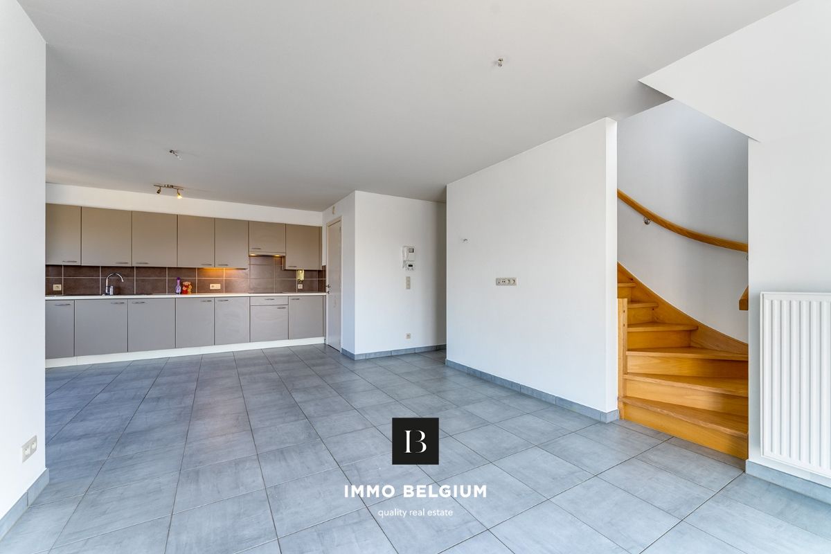 Ruim duplex appartement met 3 slaapkamers foto 6