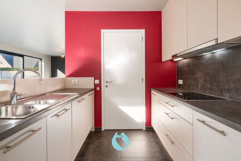 Deze woning is rustig gelegen in woonerf Brielken te Evergem foto 5