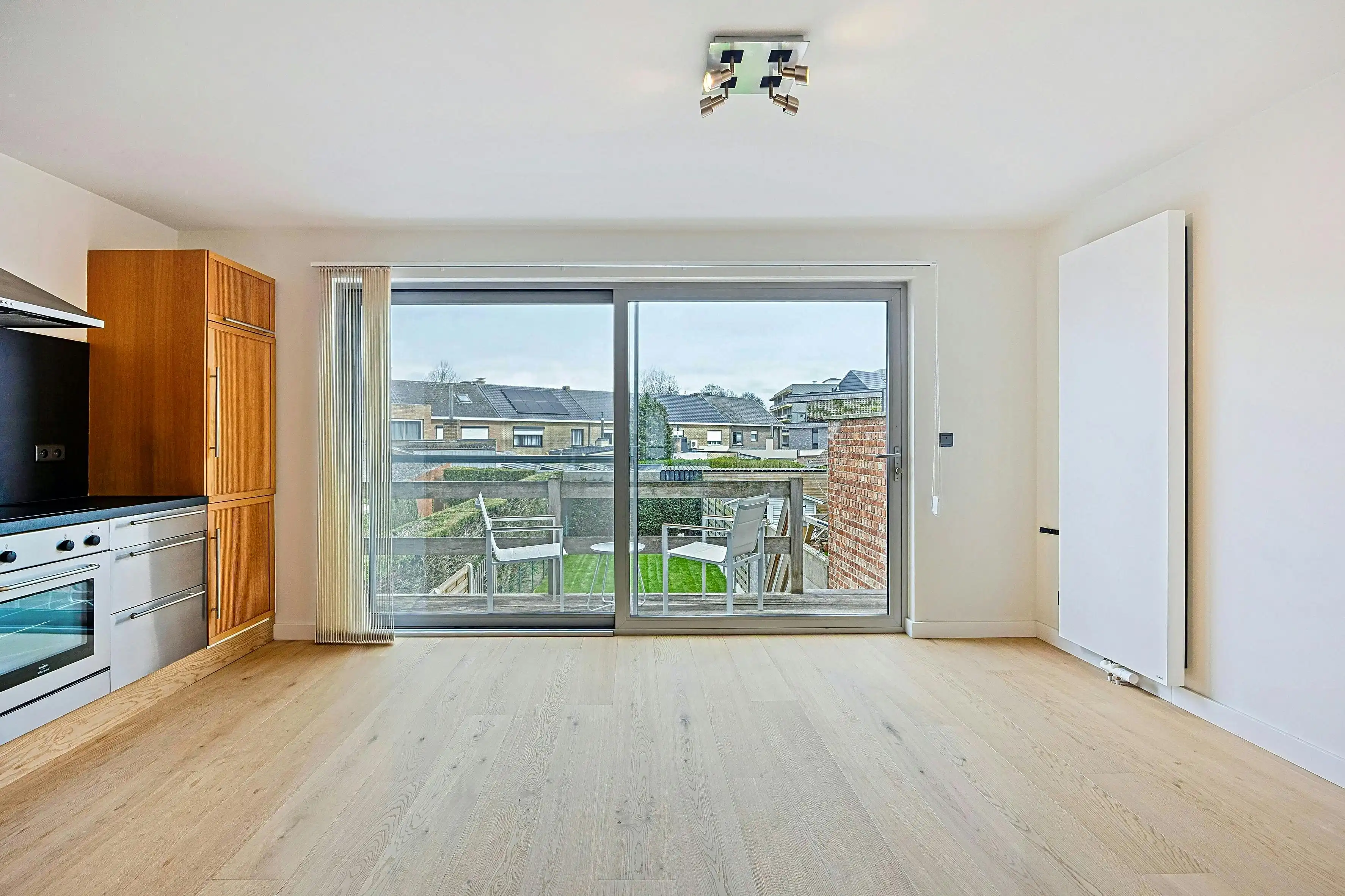 Instapklare bel-etage met 3 slaapkamers en zonnige tuin in hartje Eeklo foto 12