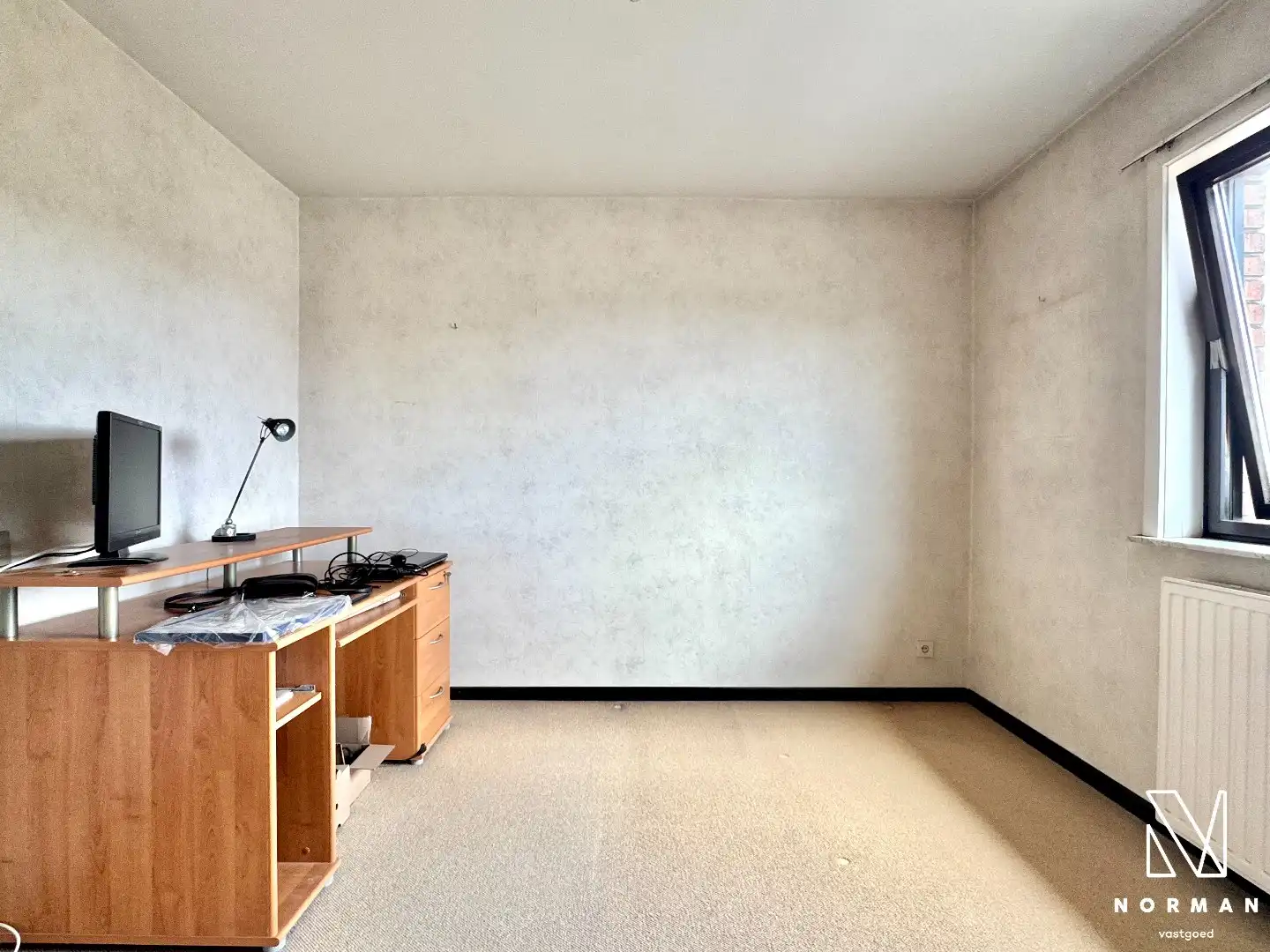 Instapklaar 2-slaapkamer appartement inclusief autostaanplaats en terras te koop in Kuurne! foto 10
