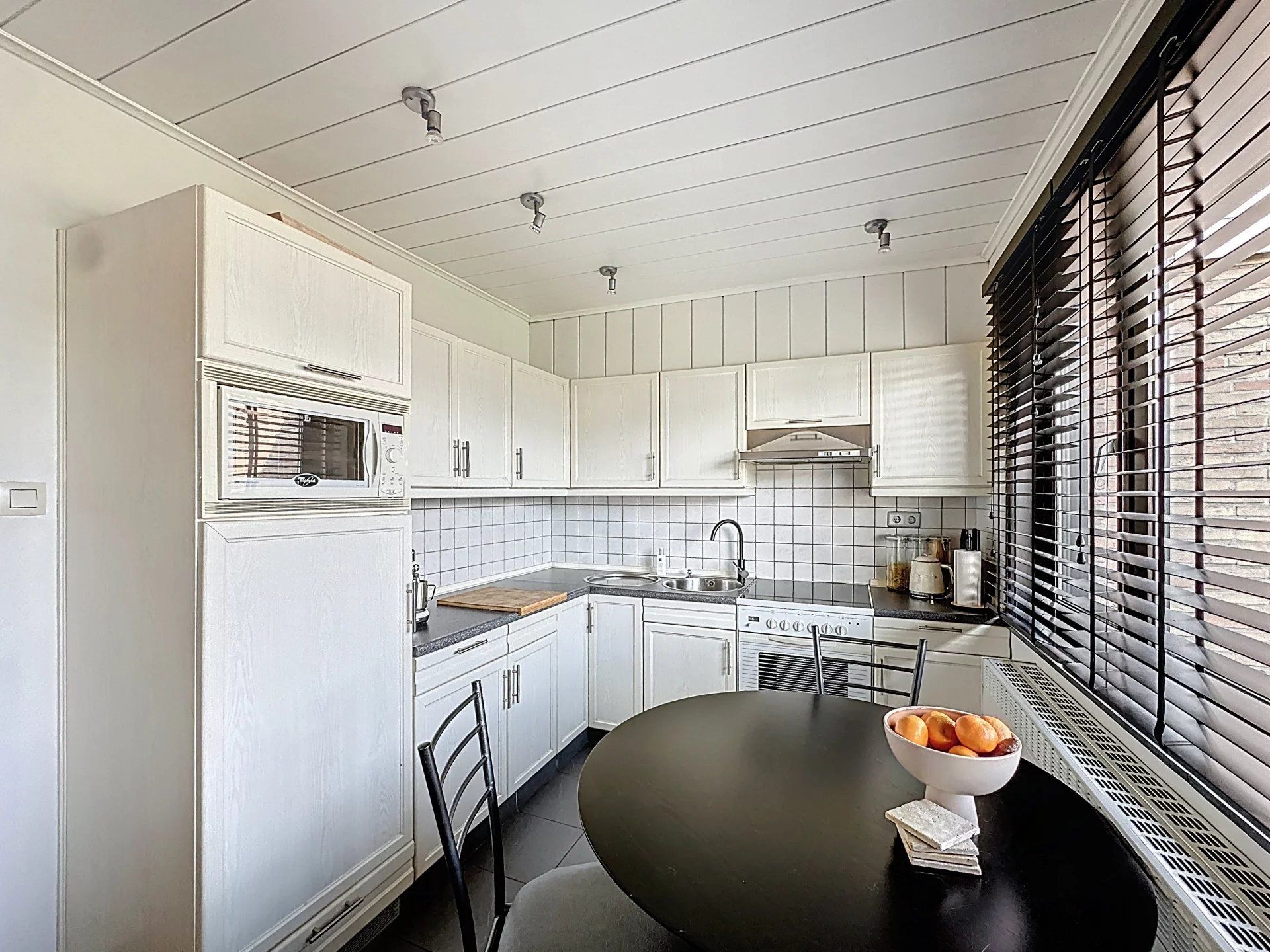 Gelijkvloerse woning op ruim perceel (8 are) in landelijke omgeving. foto 21
