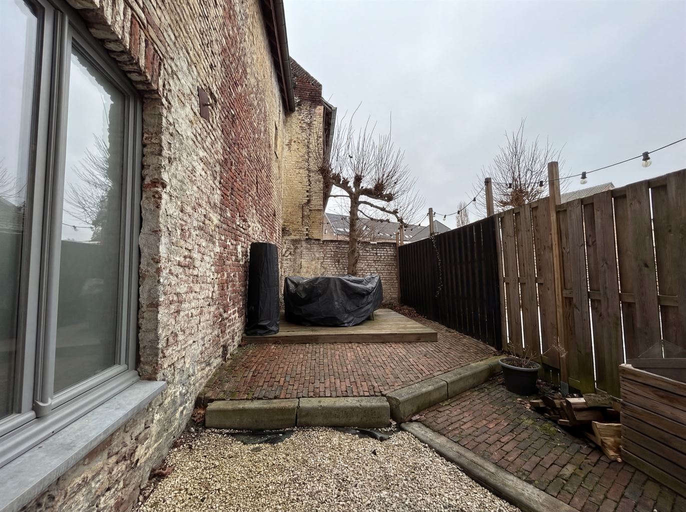 Gezellige stadswoning met 2 slaapkamers en koer, in het centrum van Maaseik. foto 13