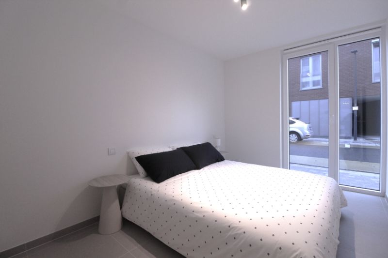 Gelijkvloers nieuwbouwappartement met tuin in centrum Tielt foto 9