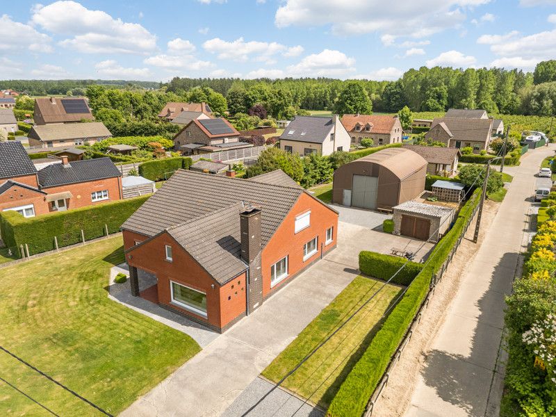 Ruime woning met loods op een perceel van 14are foto 39