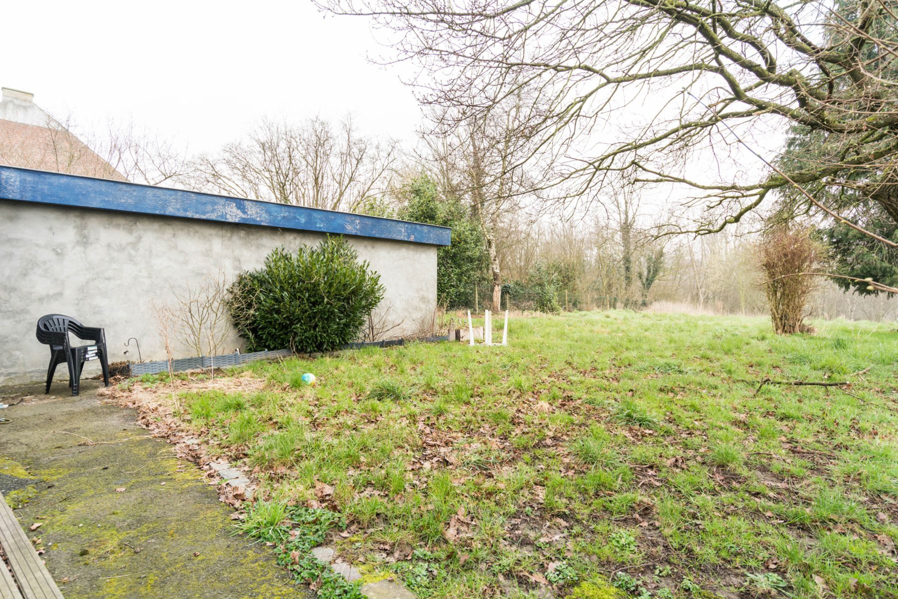 Vrijstaande woning met garage, tuin en achterliggende weide foto 3